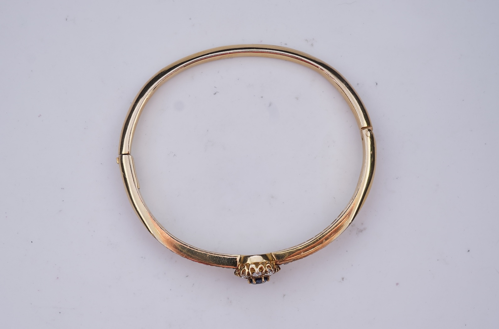 A sapphire and diamond bangle